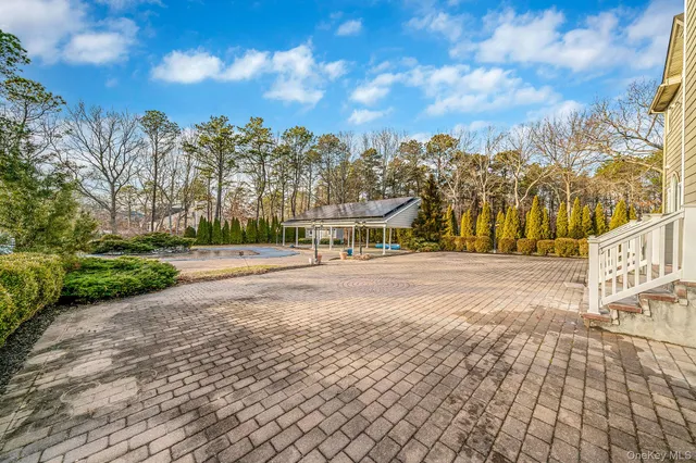 $929,000 | 44 East Margin Road, Ridge, NY 11961