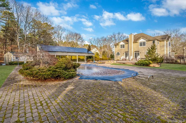 $929,000 | 44 East Margin Road, Ridge, NY 11961