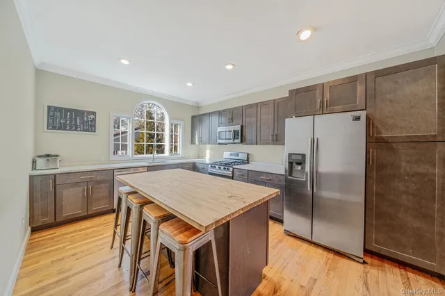 $929,000 | 44 East Margin Road, Ridge, NY 11961