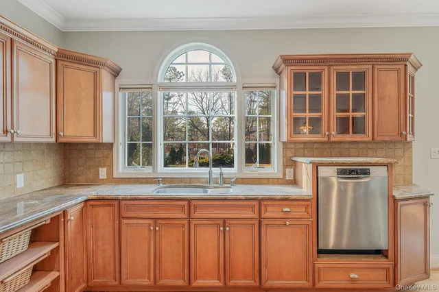 $929,000 | 44 East Margin Road, Ridge, NY 11961