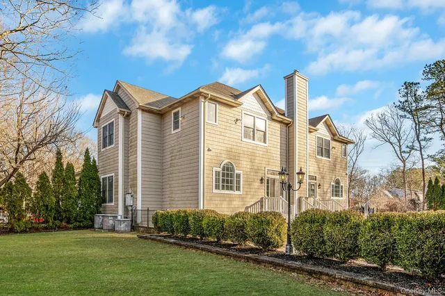 $929,000 | 44 East Margin Road, Ridge, NY 11961