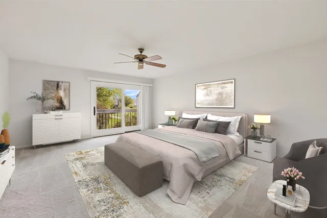 a spacious bedroom with a bed and window