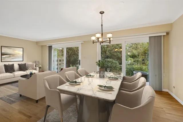 a living room with furniture and a table