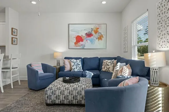 a living room with furniture and a couch