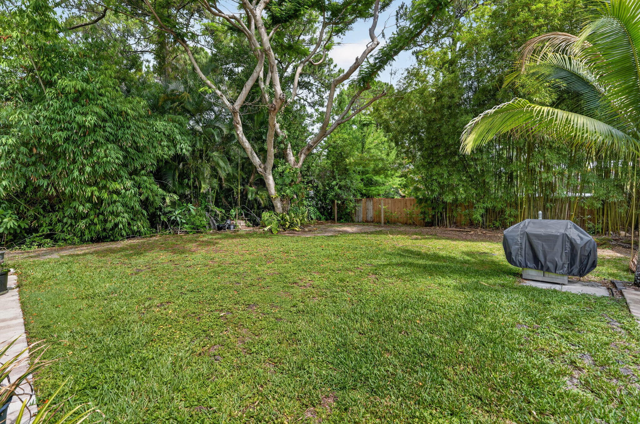 17391 Alexander Run Jupiter, FL 33478 - Photo 47 of 55 a view of a backyard