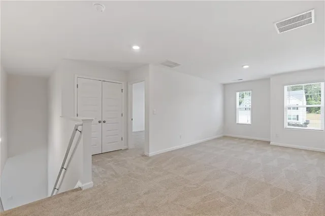 an empty room with a natural light