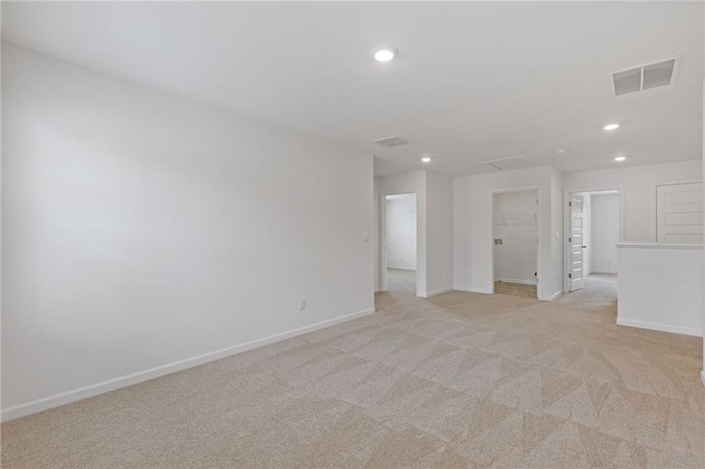 294 Ralph Still Road Dacula, GA 30019 - Photo 23 of 55 a view of an empty room