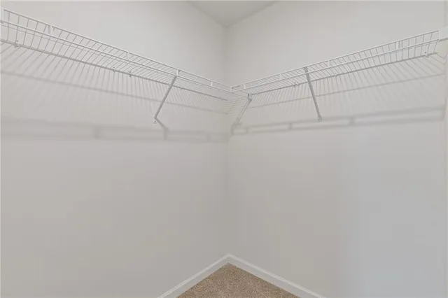 a view of a room with racks on the wall