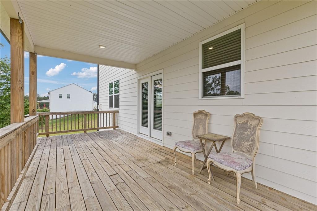 294 Ralph Still Road Dacula, GA 30019 - Photo 42 of 55 a view of a two chairs in the balcony