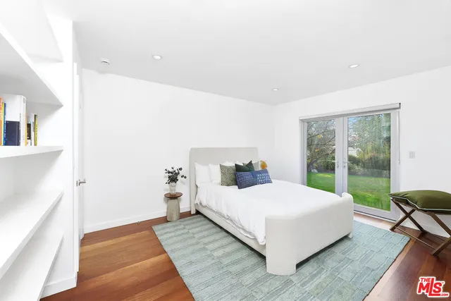 a bathroom with a bathtub sink vanity granite and a shower
