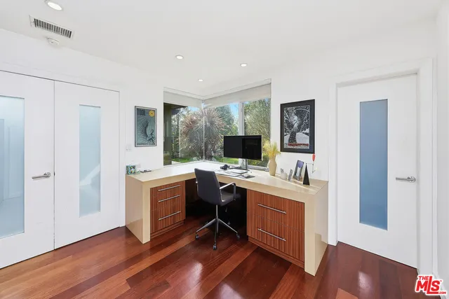 a view of a house with swimming pool and porch