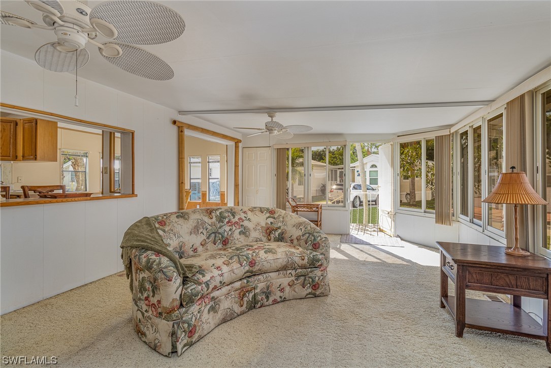 10844 Ani Circle Estero, FL 33928 - Photo 11 of 24 a living room with furniture and a large window