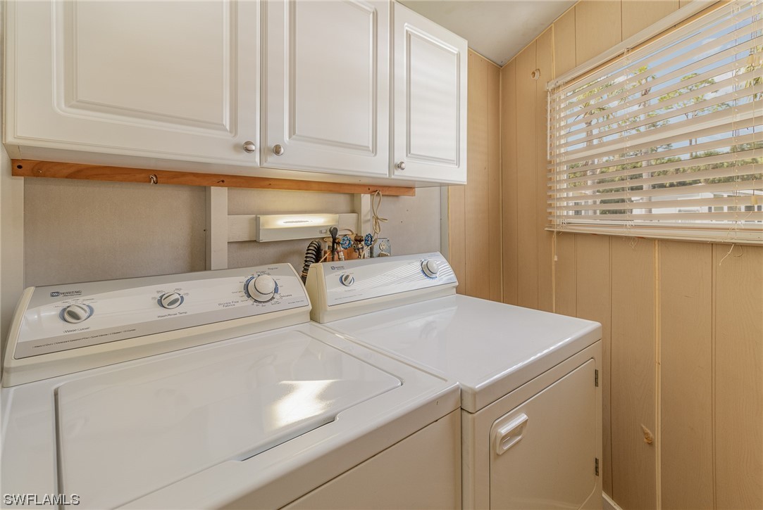 10844 Ani Circle Estero, FL 33928 - Photo 15 of 24 a utility room with dryer and washer