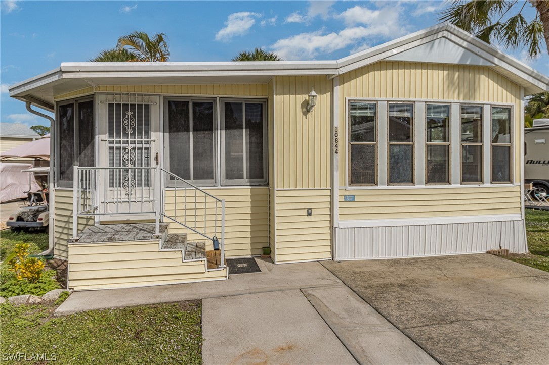 10844 Ani Circle Estero, FL 33928 - Photo 16 of 24 front view of a house