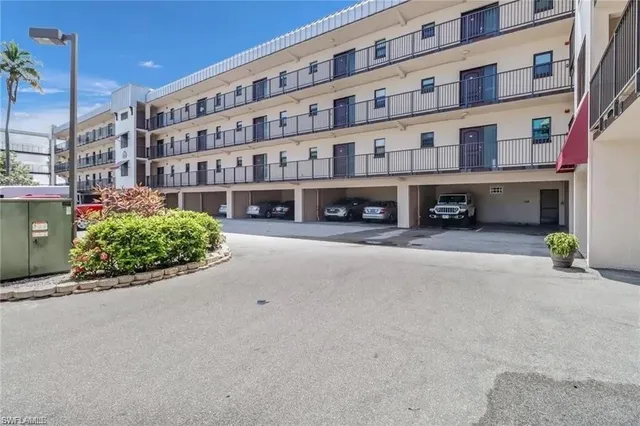 a view of a building with a garden