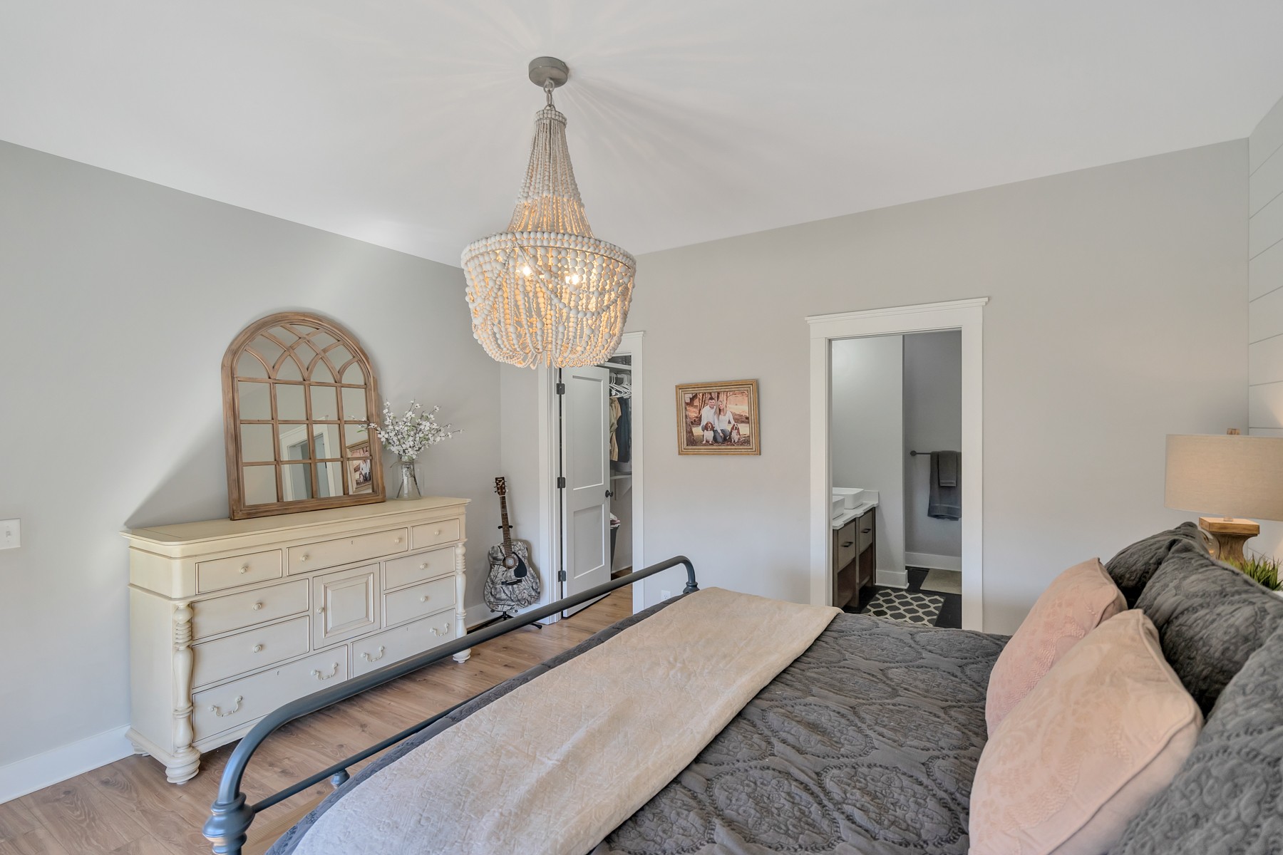 1687 Porter Road Burns, TN 37029 - Photo 11 of 32 a bedroom with a bed and dresser with mirror
