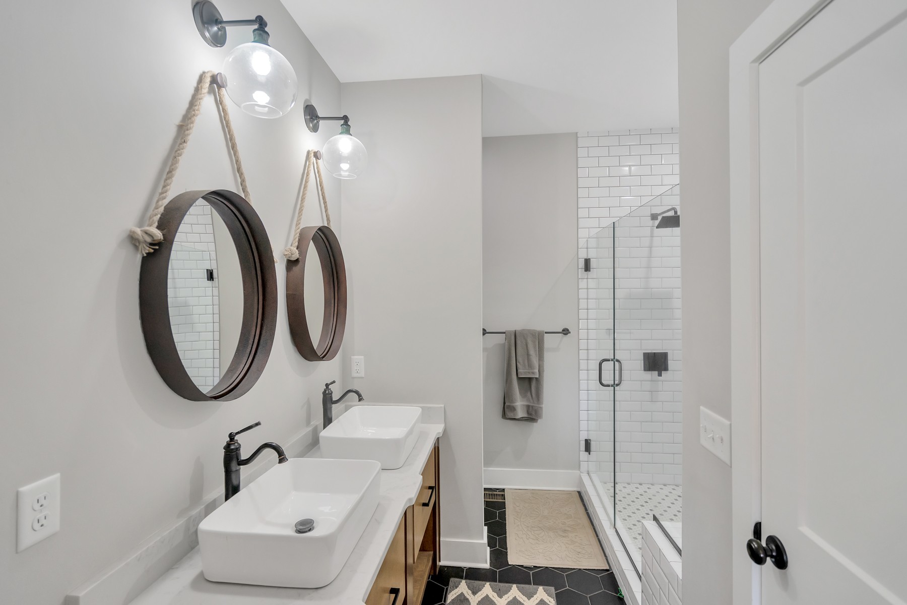 1687 Porter Road Burns, TN 37029 - Photo 13 of 32 a bathroom with a sink and a mirror