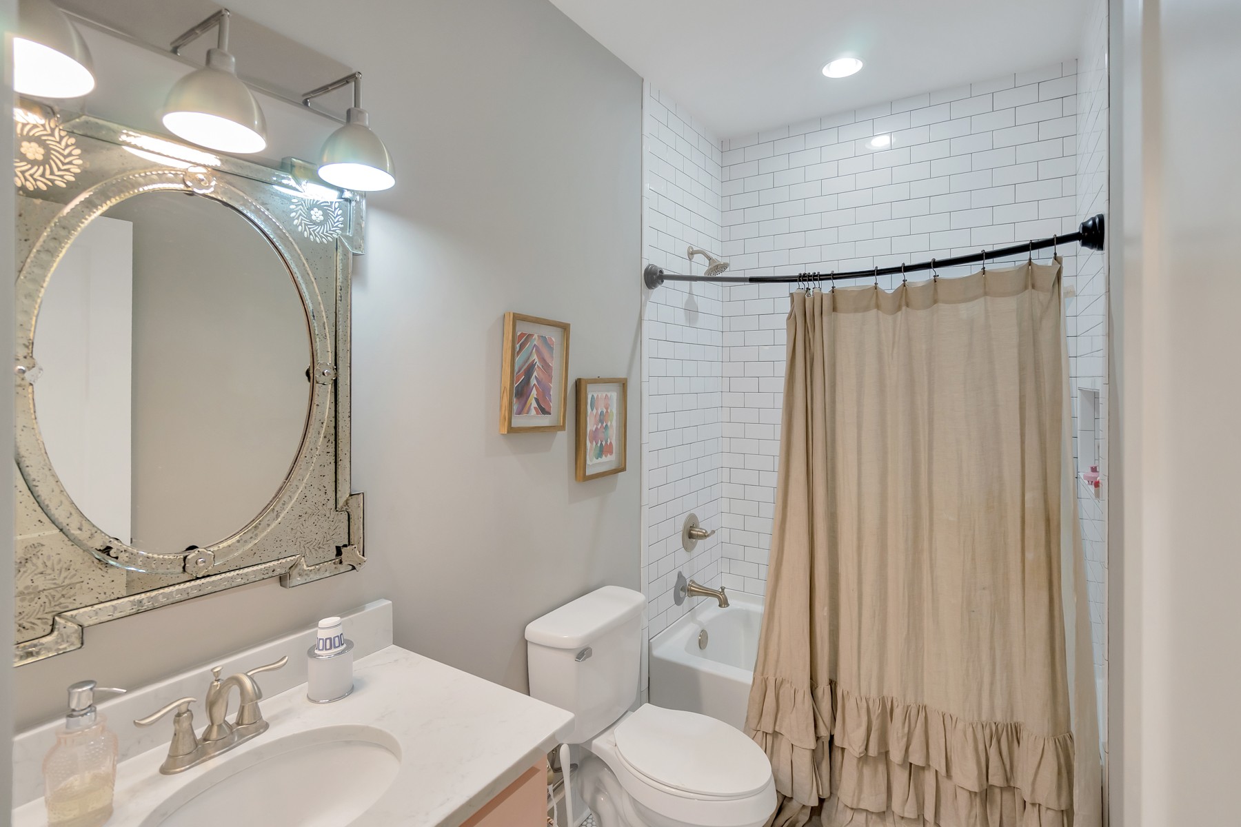 1687 Porter Road Burns, TN 37029 - Photo 17 of 32 a bathroom with a toilet a sink and a mirror