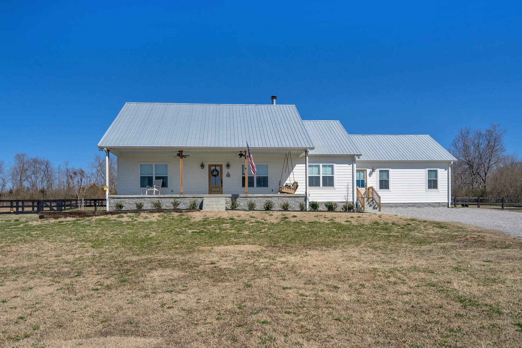1687 Porter Road Burns, TN 37029 - Photo 25 of 32 a front view of a house with a garden