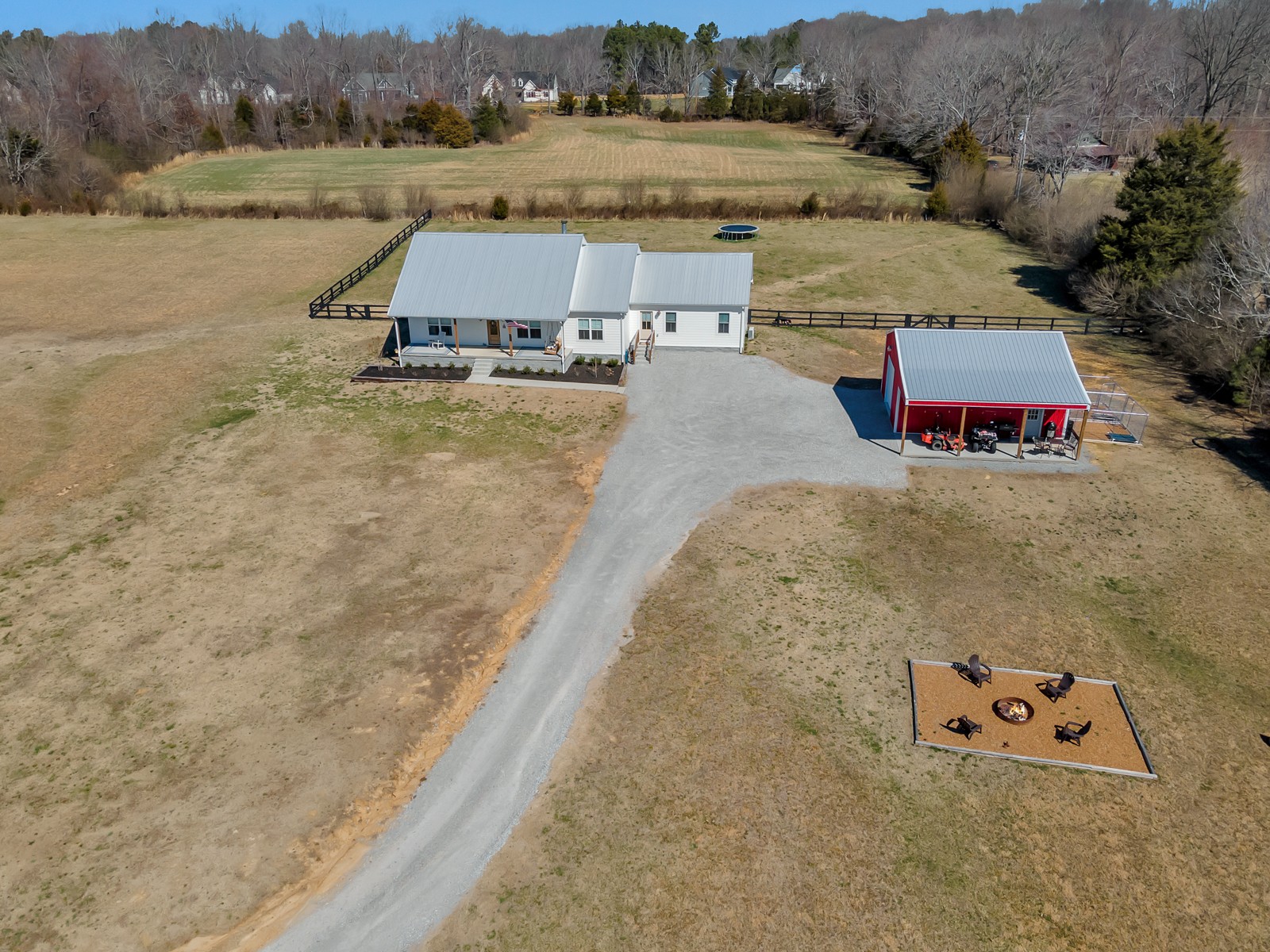 1687 Porter Road Burns, TN 37029 - Photo 27 of 32 an aerial view of a house with pool and yard