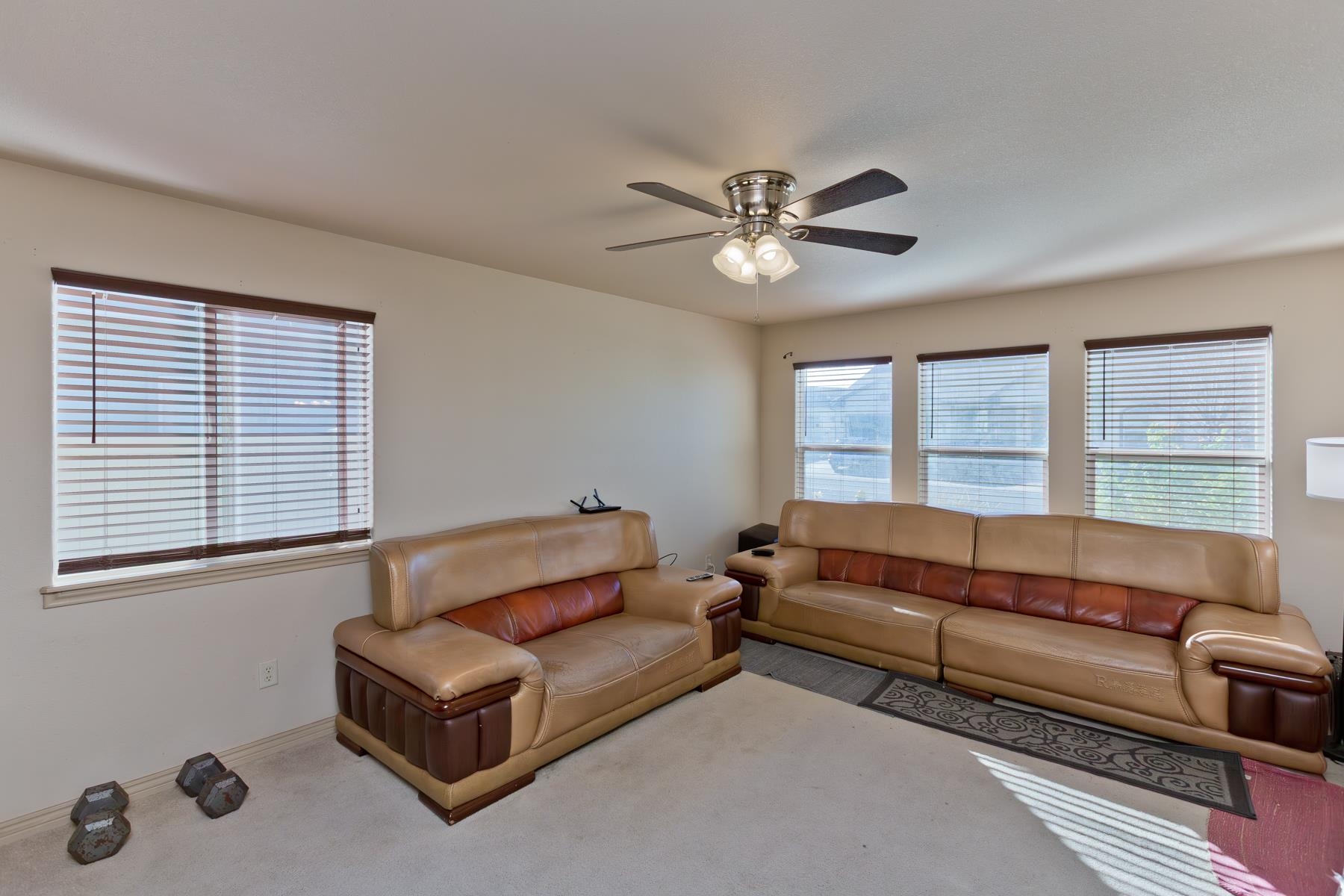 236 Frontier Street Grand Junction, CO 81503 - Photo 13 of 40 a living room with furniture and a large window