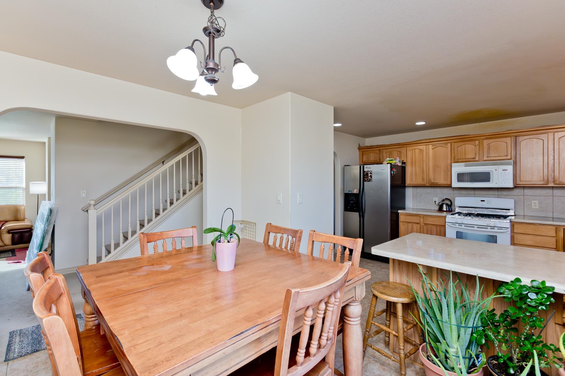 236 Frontier Street Grand Junction, CO 81503 - Photo 20 of 40 a dining room with stainless steel appliances a table and chairs