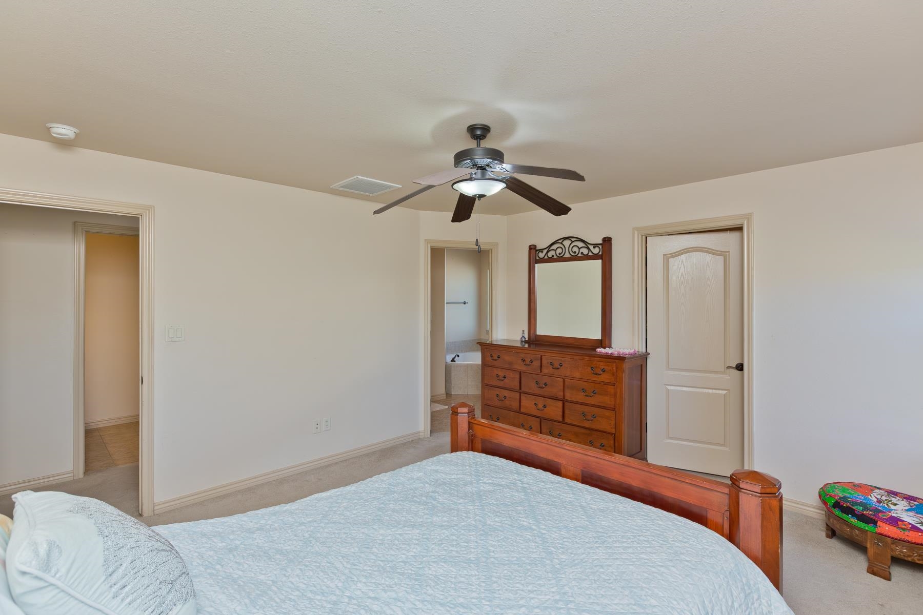 236 Frontier Street Grand Junction, CO 81503 - Photo 29 of 40 a bedroom with a bed and a dresser