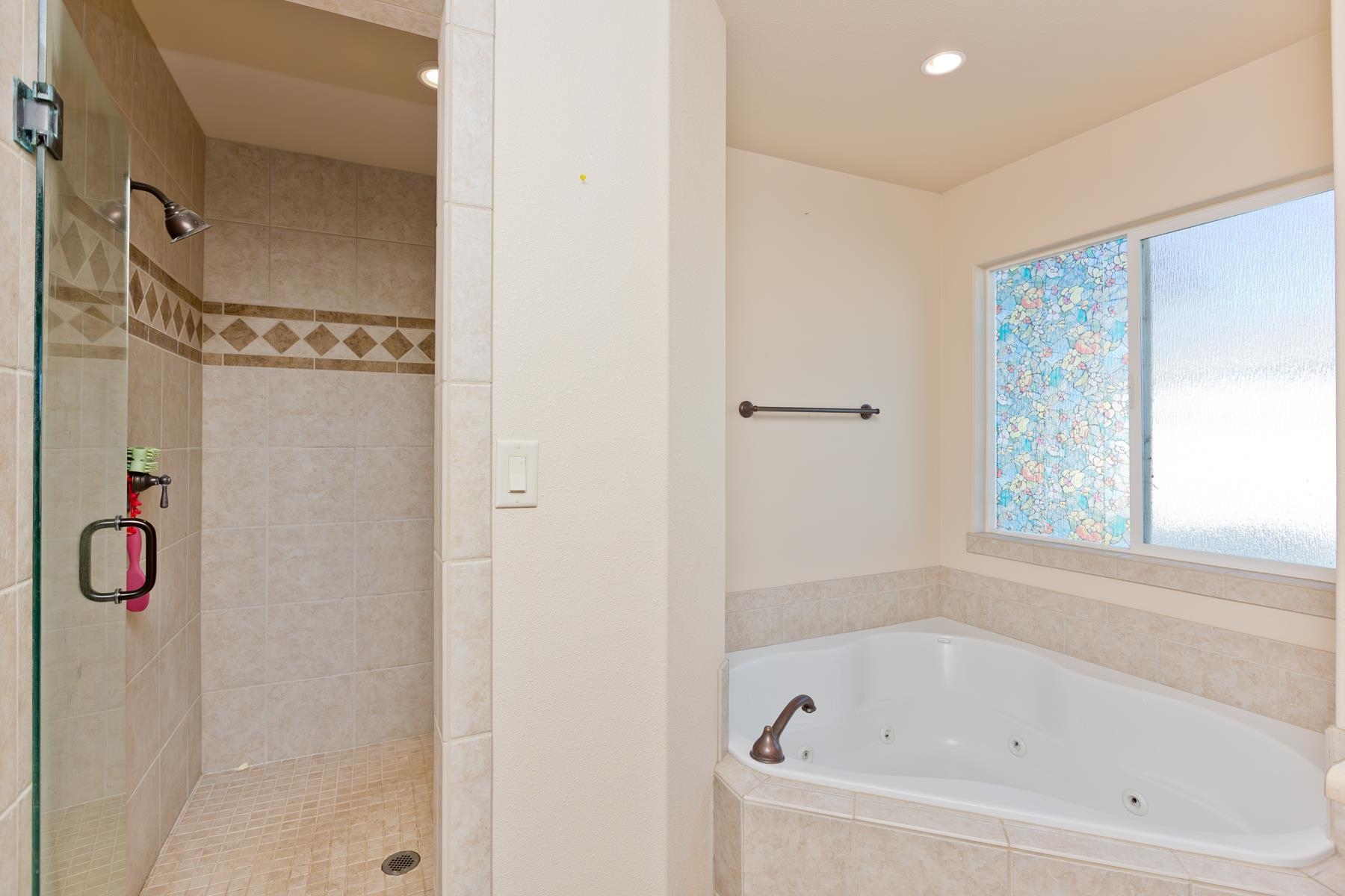 236 Frontier Street Grand Junction, CO 81503 - Photo 30 of 40 a white bath tub sitting next to a shower