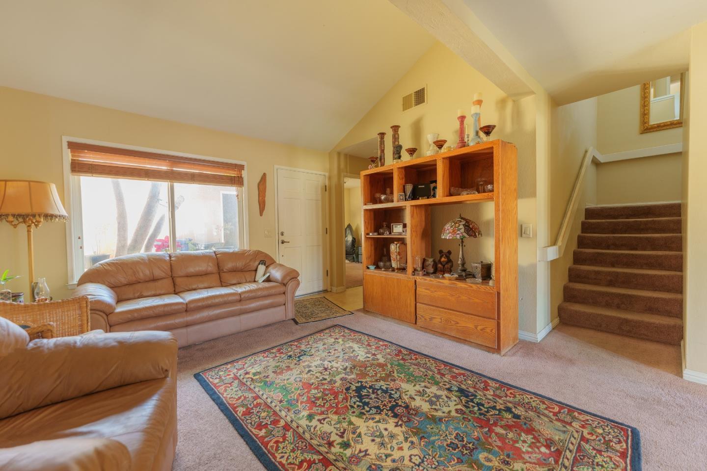 19308 Creekside Circle Salinas, CA 93908 - Photo 5 of 21 a living room with furniture and a rug