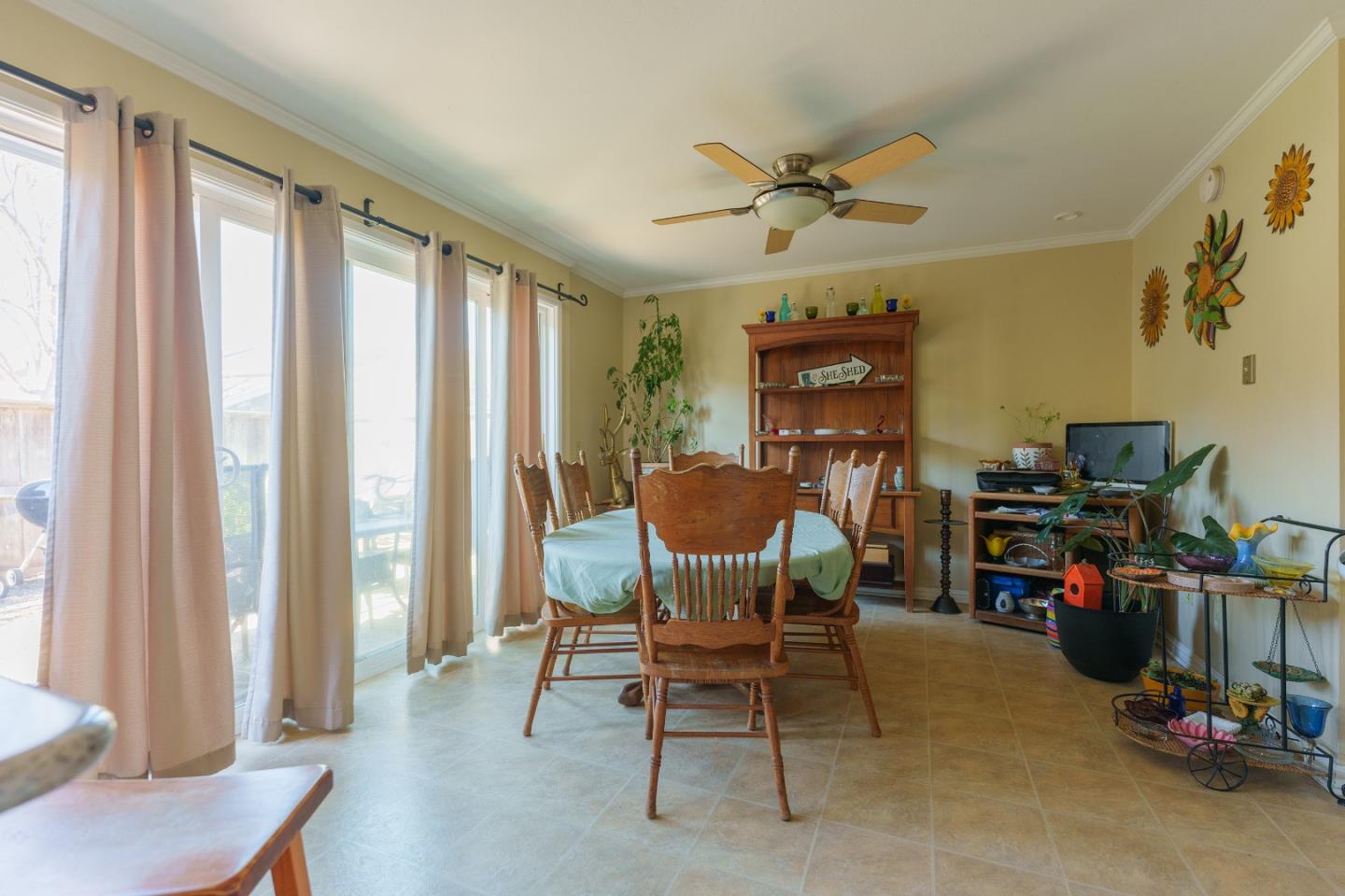 19308 Creekside Circle Salinas, CA 93908 - Photo 10 of 21 a view of a workspace with furniture and a window