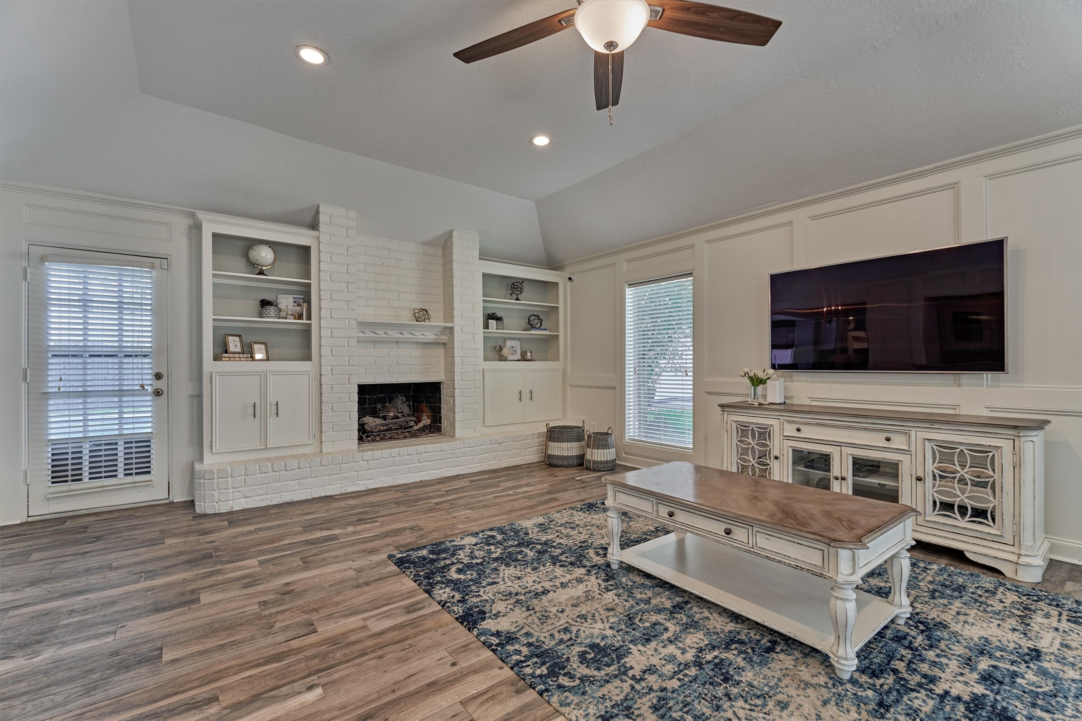 6522 Castle Pine Lane Spring, TX 77379 - Photo 35 of 49 a living room with furniture and a flat screen tv