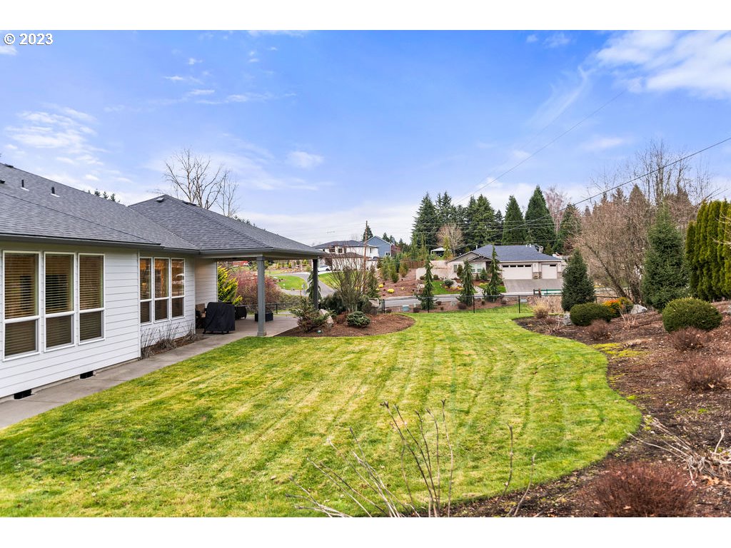 4501 Northwest 122nd Street Vancouver, WA 98685 - Photo 27 of 28 a swimming pool with outdoor seating and yard