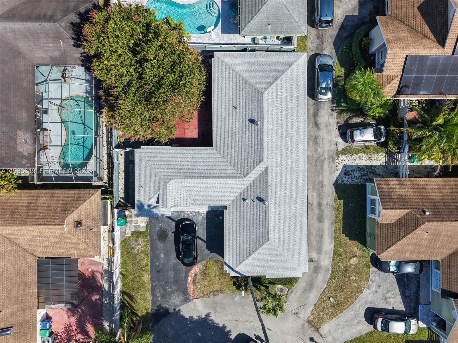 10135 Southwest 139th Place Miami, FL 33186 - Photo 23 of 25 an aerial view of residential houses with outdoor space