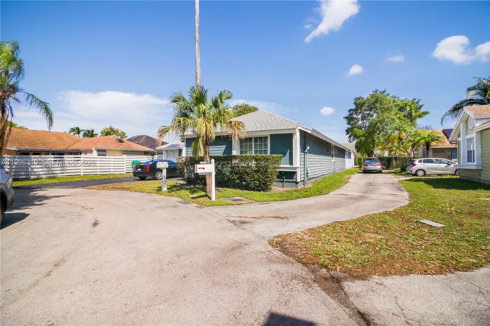10135 Southwest 139th Place Miami, FL 33186 - Photo 24 of 25 a view of outdoor space yard and front view of a house