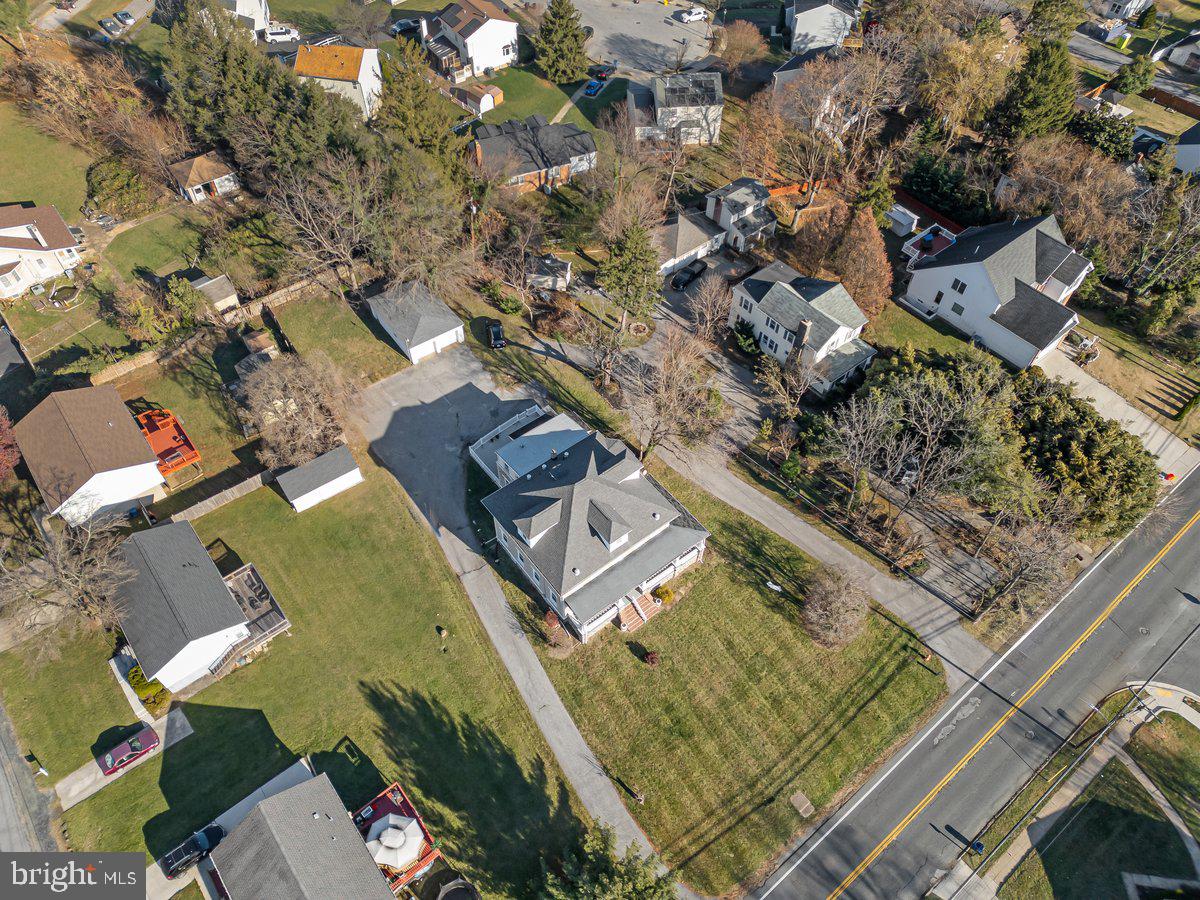 6830 Windsor Mill Road Baltimore, MD 21207 - Photo 42 of 47 an aerial view of a residential houses with outdoor space
