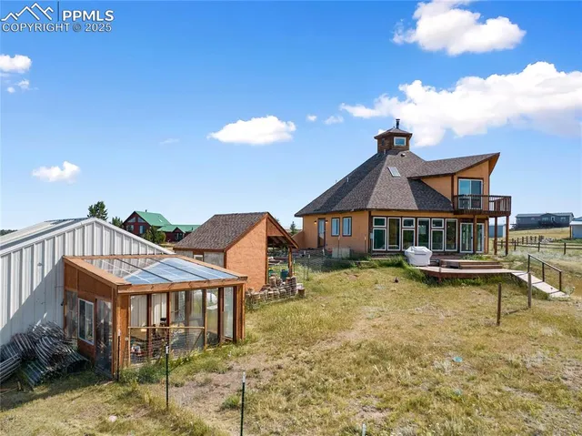 a view of a house with roof deck