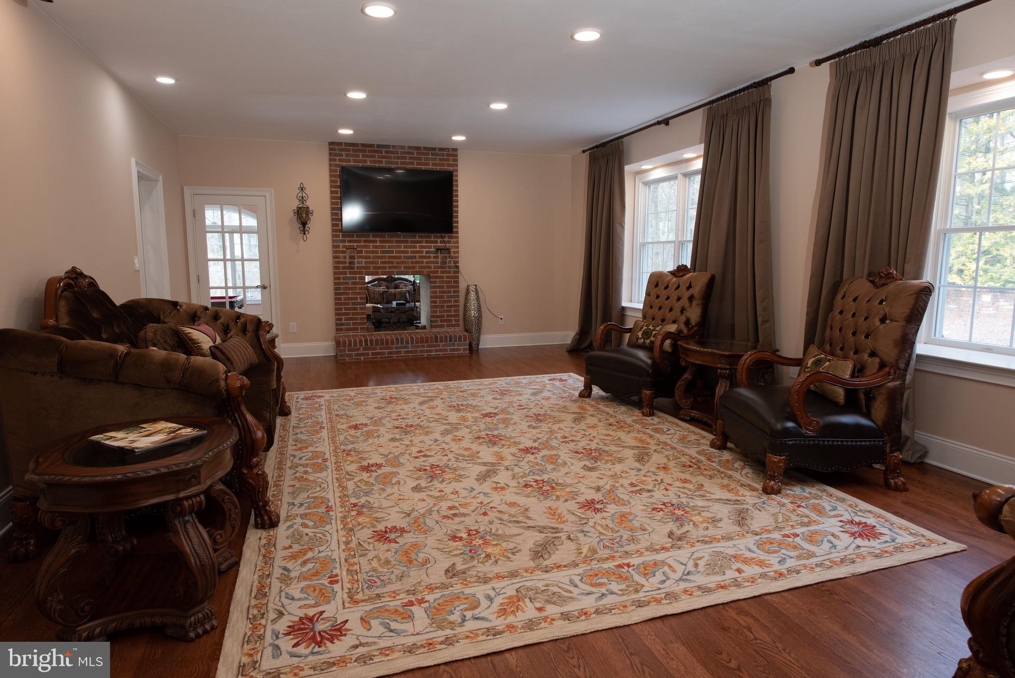 3450 Woodward Road Huntingdon Valley, PA 19006 - Photo 44 of 54 a living room with furniture and a flat screen tv