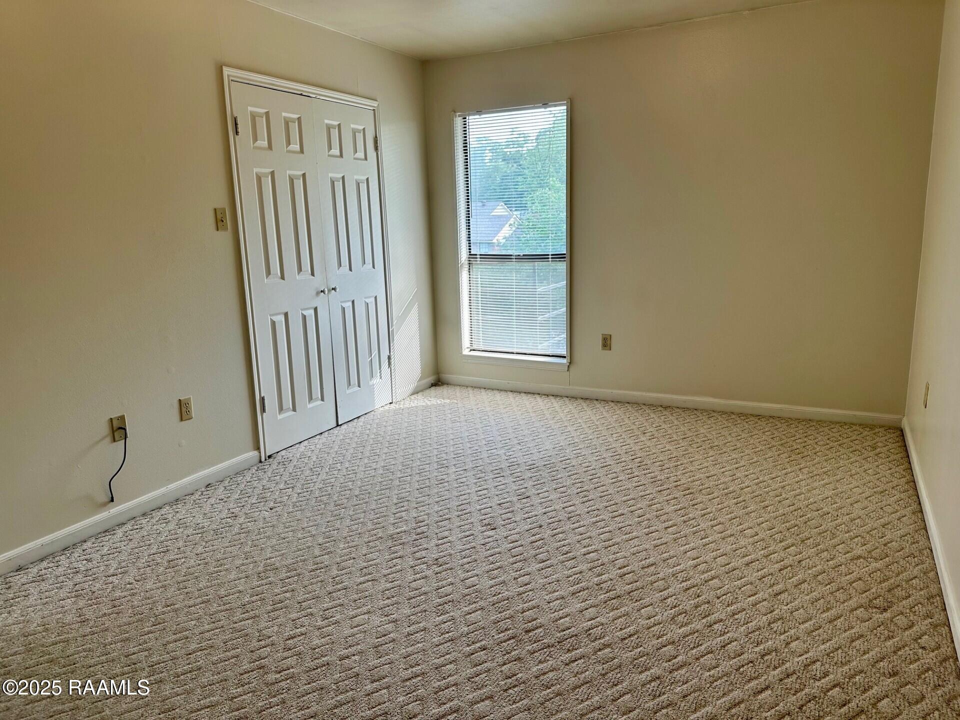 701 South College Road, Unit 309 Lafayette, LA 70503 - Photo 9 of 11 Bedroom 4.21.25