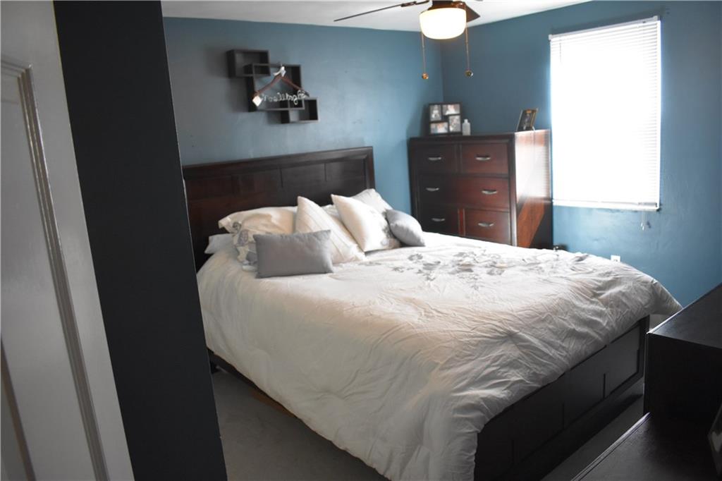 3858 Edge Road Pittsburgh, PA 15227 - Photo 17 of 23 Freshly painted bedroom with a ceiling fan light