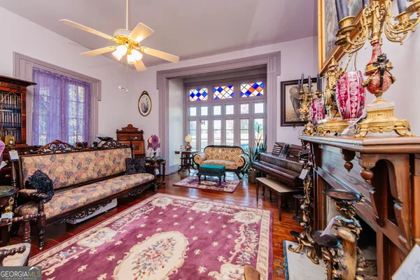 a view of living room with furniture and a window