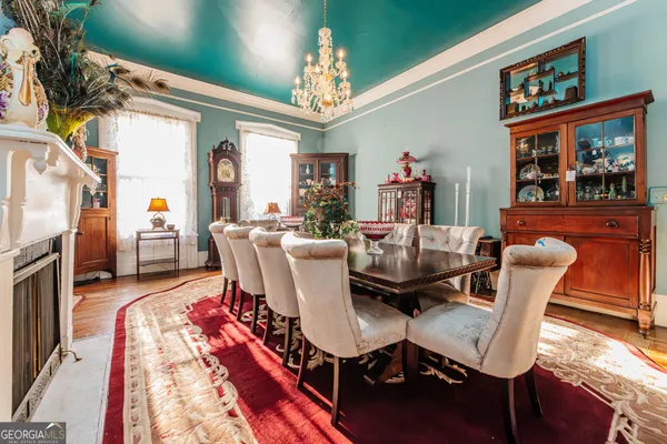 a bed room with a bed and a fireplace