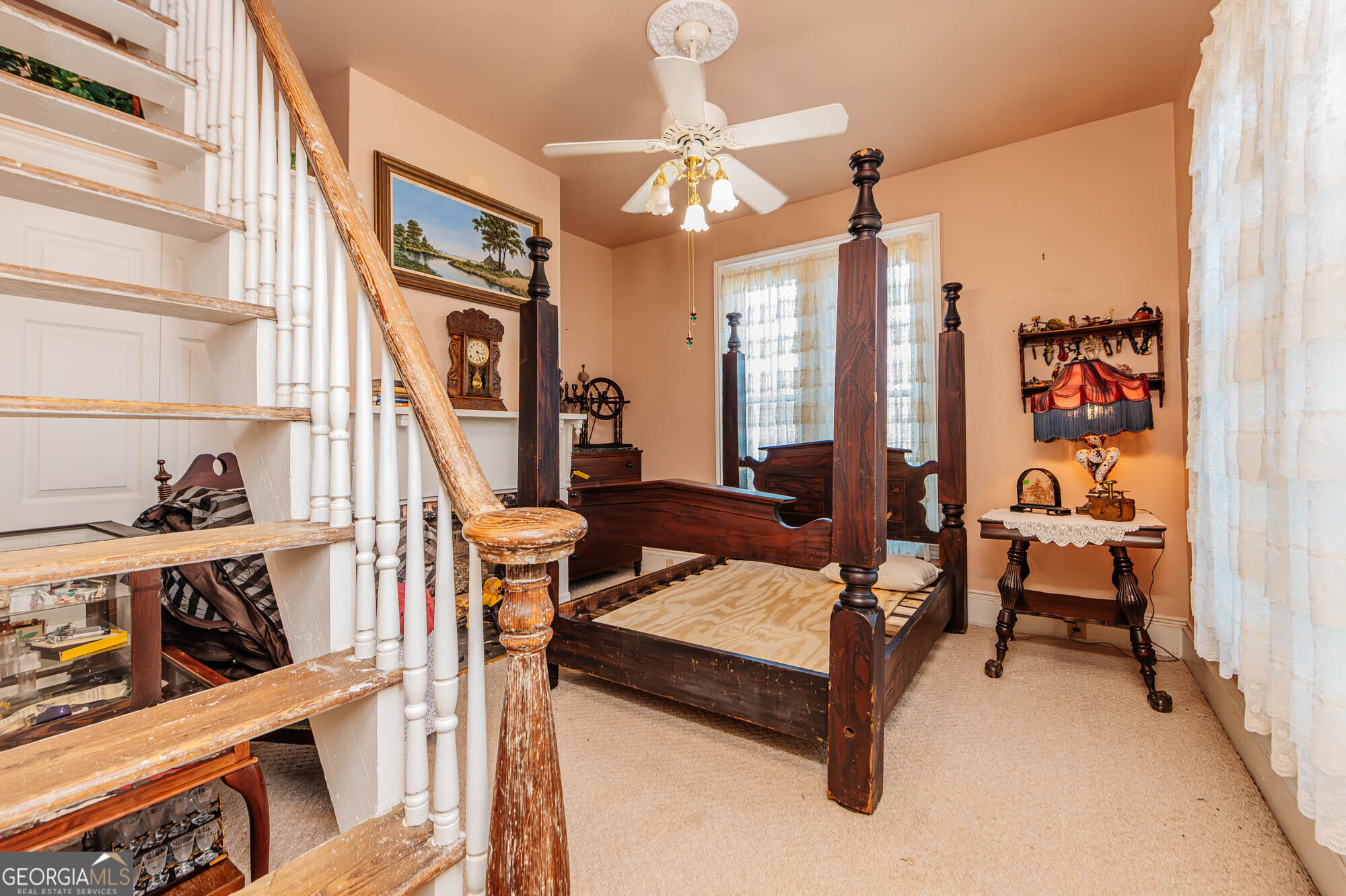 200 Felton Road Perry, GA 31069 - Photo 45 of 128 a living room with furniture a rug and a chandelier