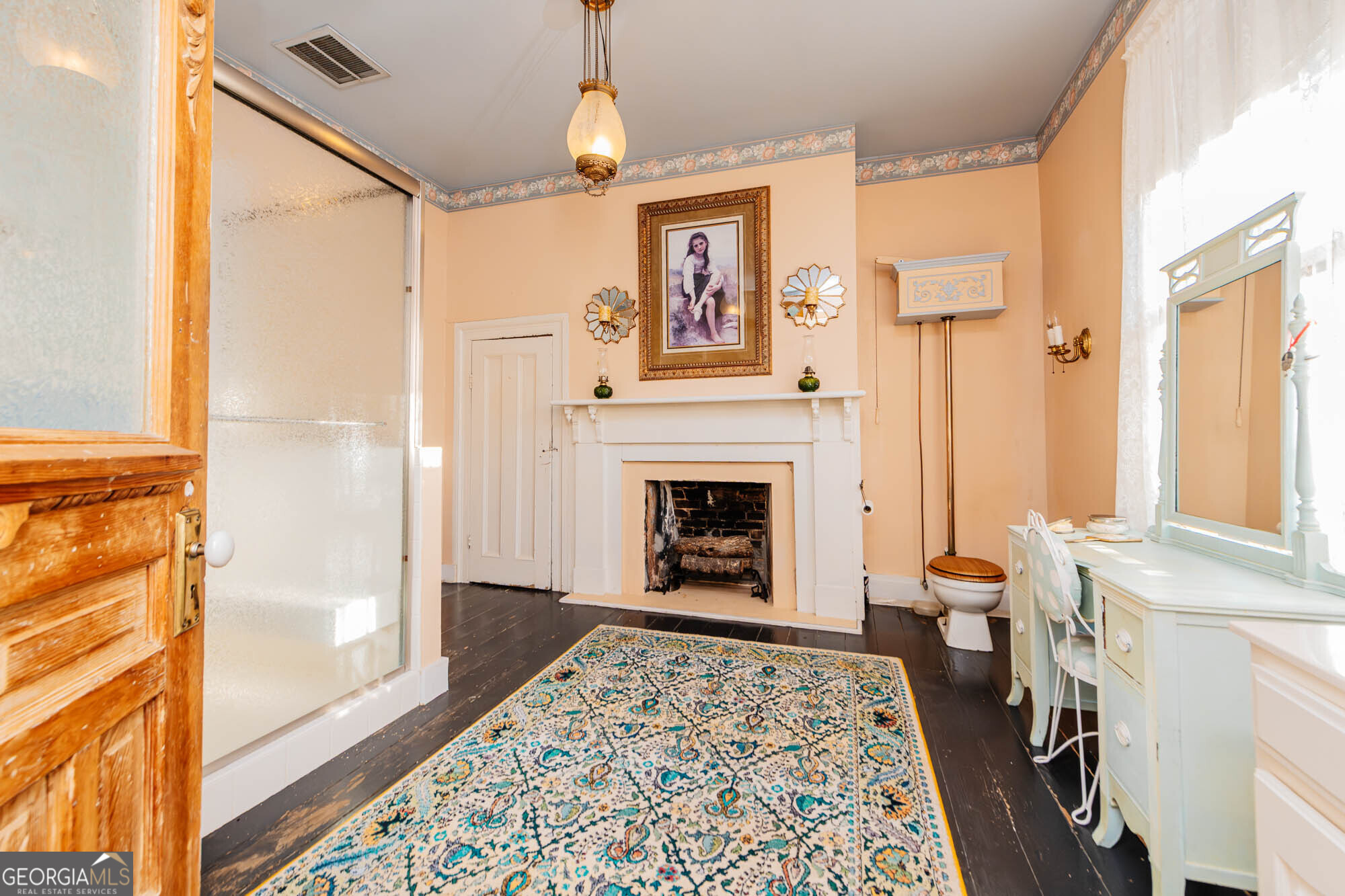 200 Felton Road Perry, GA 31069 - Photo 58 of 128 a living room with furniture a large window and a fireplace