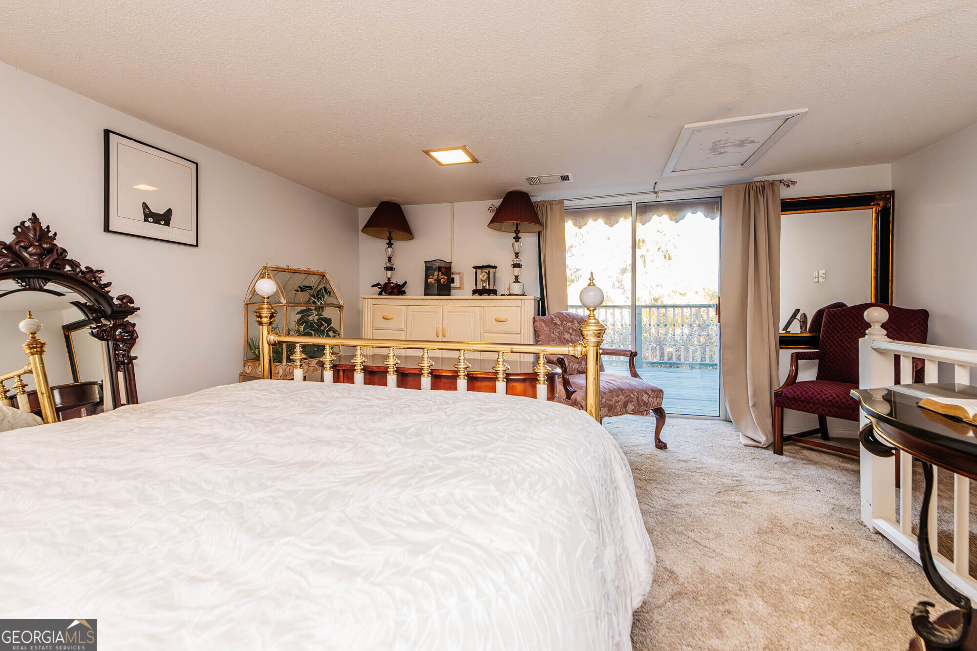 200 Felton Road Perry, GA 31069 - Photo 81 of 128 a bedroom with furniture and a large window