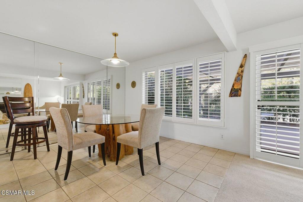 19137 Index Street, Unit 9 Porter Ranch, CA 91326 - Photo 15 of 39 a dining room with furniture and window