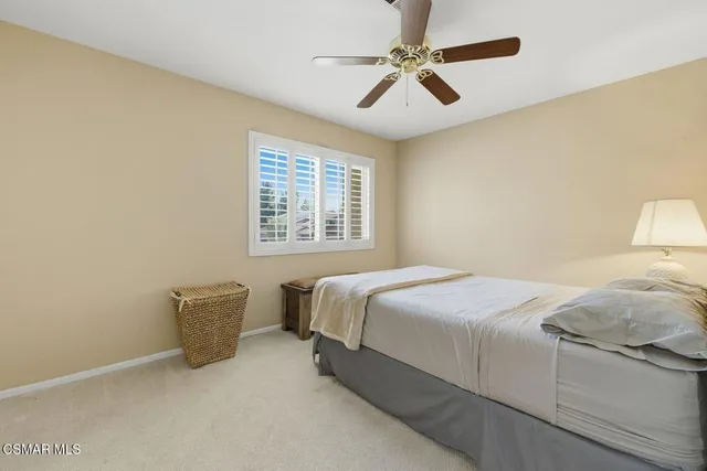 a bedroom with a bed and furniture