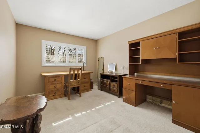 a room with furniture and cabinets