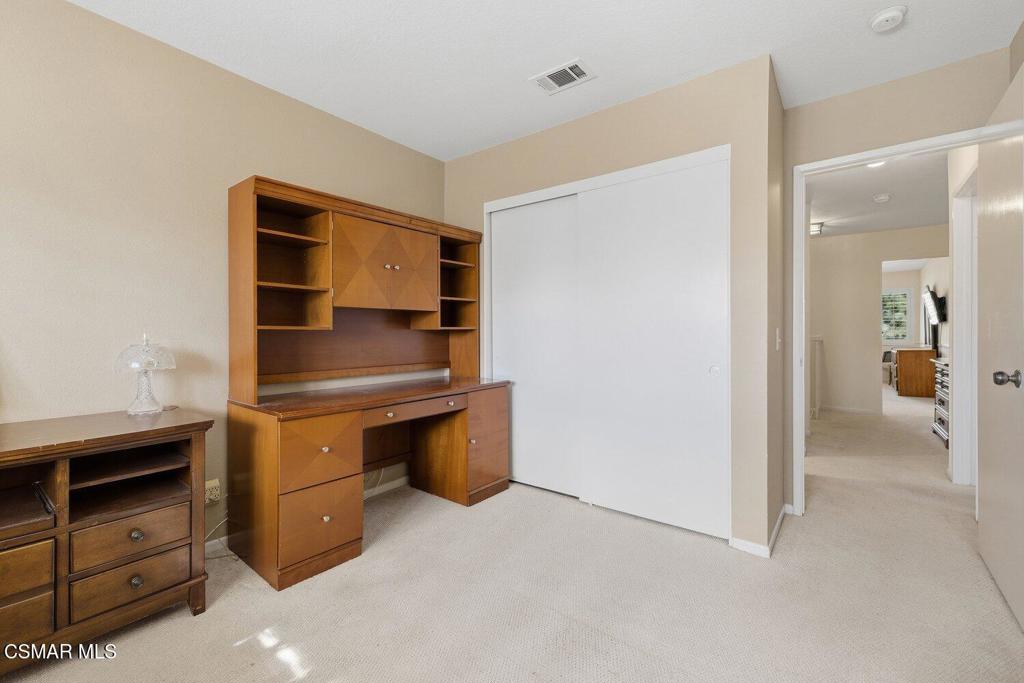 19137 Index Street, Unit 9 Porter Ranch, CA 91326 - Photo 33 of 39 a room with furniture and cabinets