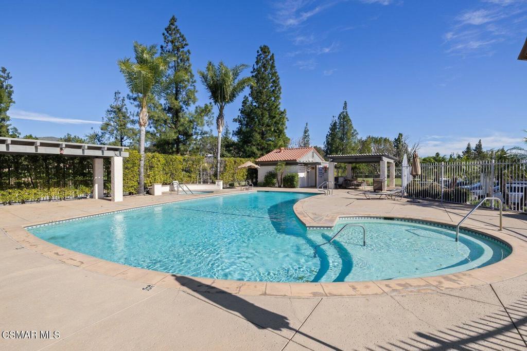 19137 Index Street, Unit 9 Porter Ranch, CA 91326 - Photo 35 of 39 a view of a swimming pool with a patio