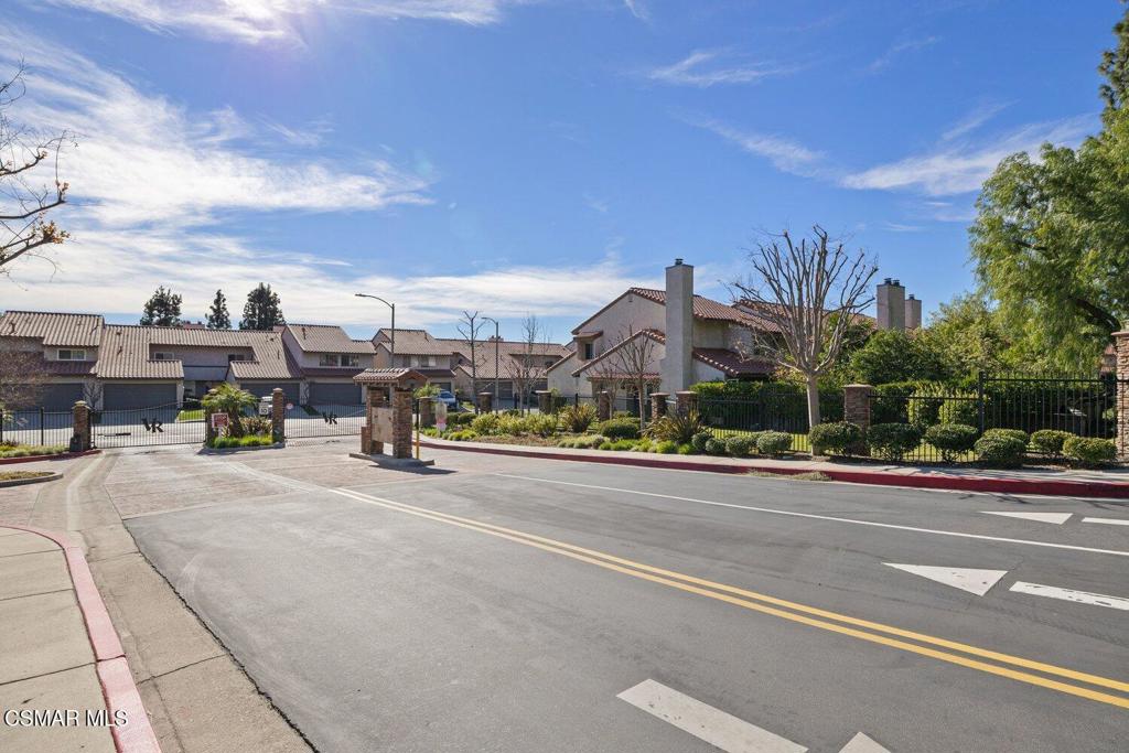 19137 Index Street, Unit 9 Porter Ranch, CA 91326 - Photo 36 of 39 a view of a city street with a building